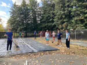 Team members prepping boat rack area at CIM